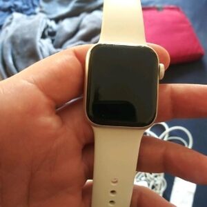 Apple Smartwatch with Gold Case and Cream Band